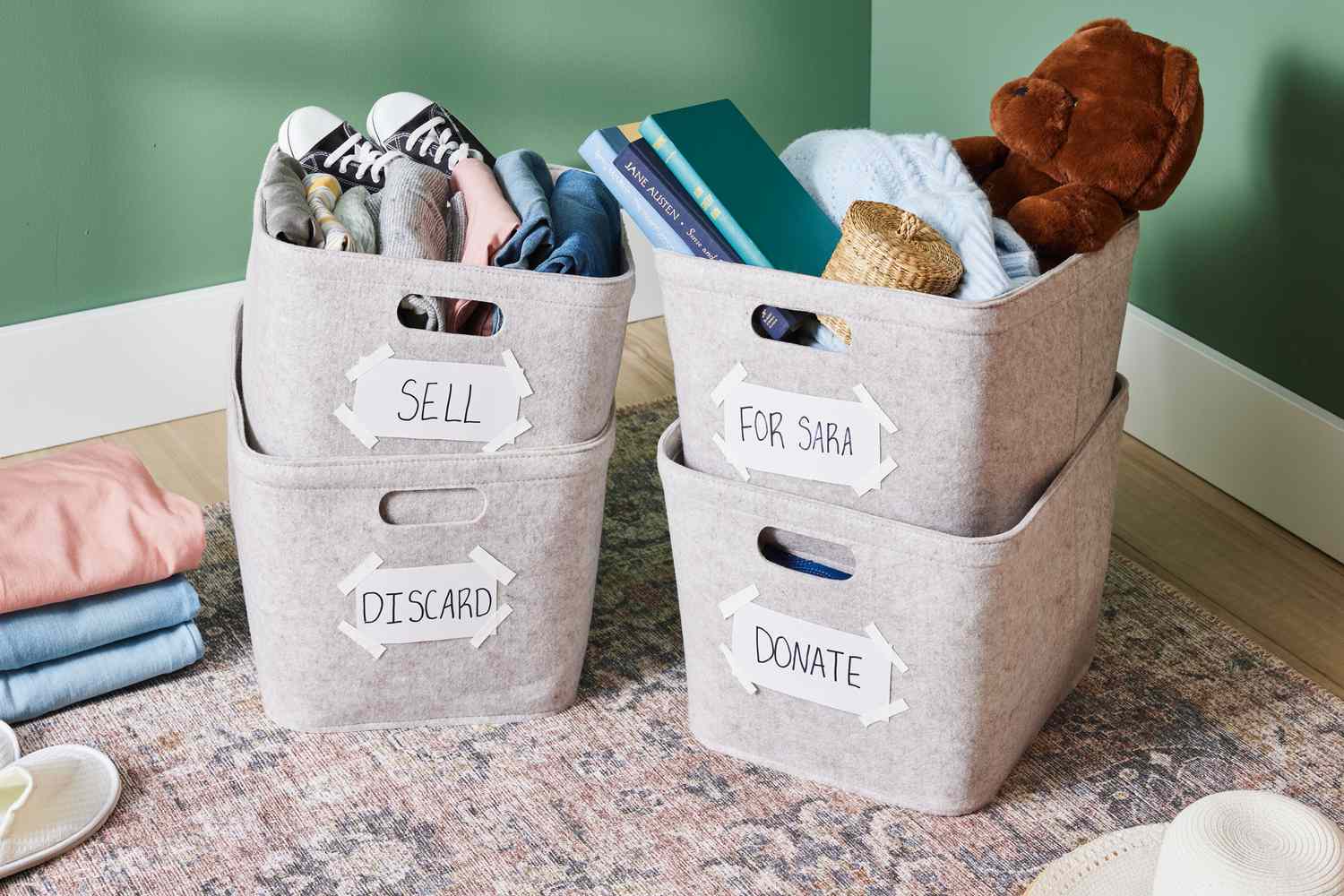 Sorting belongings into keep and donate piles