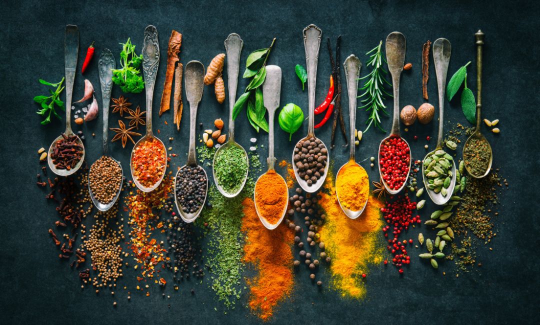 An assortment of spices in small jars